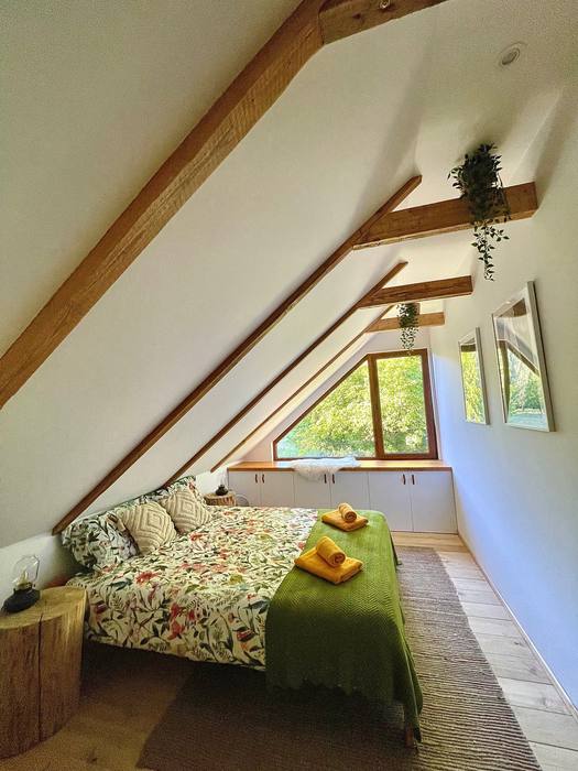 Wilcza Polana — jasne wnętrze z drewnianym sufitem, apartament Mazury Węgorzewo